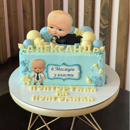 Торт на пол годика #2228 с картинкой босс и шоколадными шариками, голубой