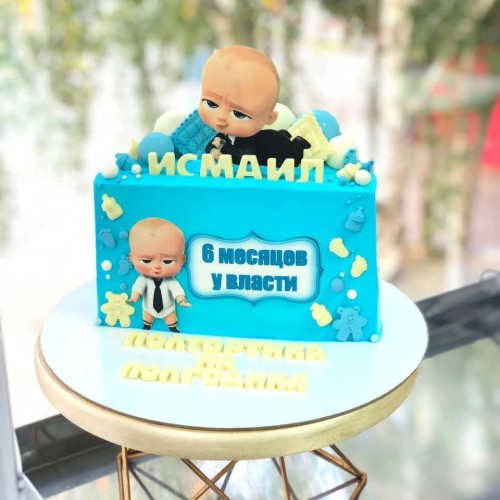 Торт на пол годика #2382 с картинкой босс и шоколадными шариками, голубой